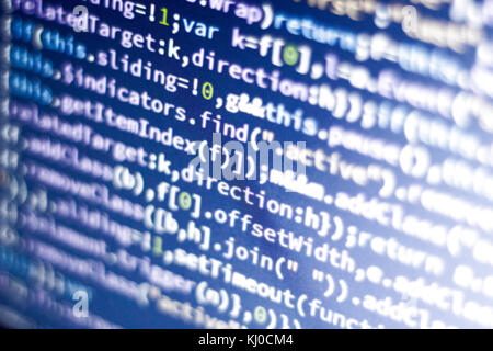 Minificated rougeoyant du code javascript. Résumé de l'écran. développeur web moderne hacking réseau informatique. Banque D'Images
