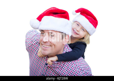 Happy father and daughter wearing santa hats isolé sur fond blanc. Banque D'Images