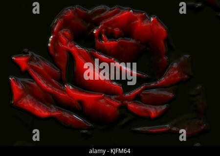 Résumé arrière-plan décoratif sous la forme d'une rose rouge sur un verre sur un fond noir Banque D'Images