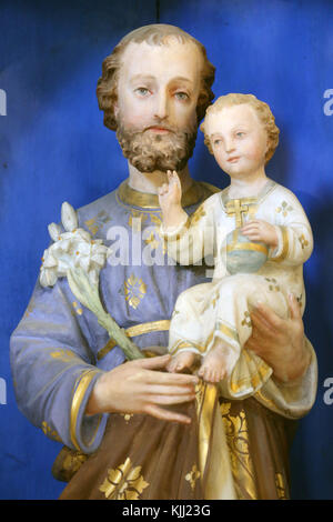 Les Plagnes chapelle baroque. Saint Joseph et l'enfant Jésus. La France. Banque D'Images