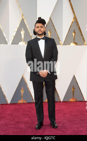 HOLLYWOOD, CA - FÉVRIER 28 : The Weeknd assiste à la 88e cérémonie annuelle des Oscars au Hollywood & Highland Center le 28 février 2016 à Hollywood, Californie. Les gens : le Weeknd Banque D'Images