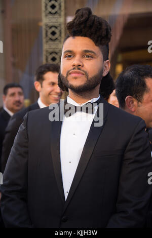 HOLLYWOOD, CA - FÉVRIER 28 : The Weeknd assiste à la 88e cérémonie annuelle des Oscars au Hollywood & Highland Center le 28 février 2016 à Hollywood, Californie. Les gens : le Weeknd Banque D'Images