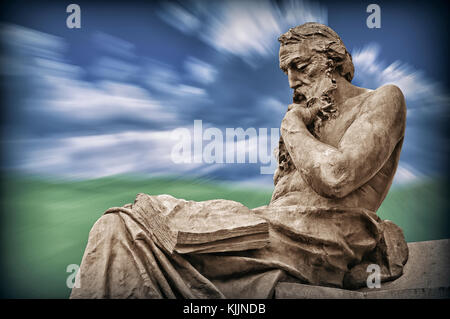 Statue d'un homme lecture à Valladolid, Château et Leon, Espagne. Banque D'Images