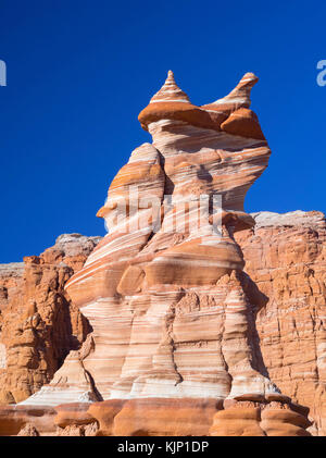 Matin vue du Clown Hopi, une formation de grès Moenave dans l'Adeii Echii Falaises de Coconino county, Arizona. Banque D'Images