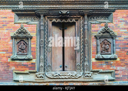 Mul chowk, courtyard wall statues sculptées, Hanuman Dhoka palais royal, Patan Durbar Square, site du patrimoine mondial de l'UNESCO, la vallée de Katmandou, Lalitpur, pen Banque D'Images