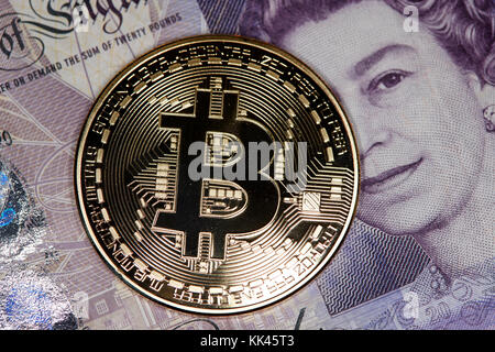 Grands livres britanniques et bitcoin paiement Banque D'Images