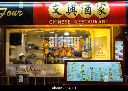 Croustillant de canard nourriture chinoise s'affichent dans la fenêtre restaurant chinois, Chinatown, Londres Uk Banque D'Images