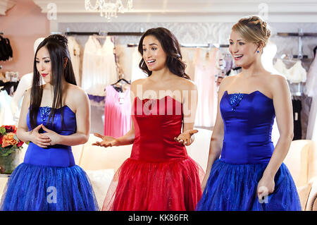 Quand LES ÉTINCELLES VOLENT 2014 Hallmark Channel film avec de gauche: Vicky Huang, Meghan Markle , Chelsey Reist Banque D'Images