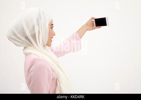 Close up of malay femme selfies Banque D'Images