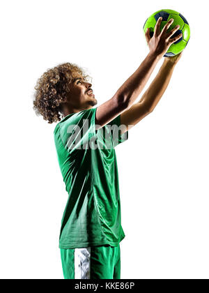 Une race mixte adolescent joueur de football homme jouant en silhouette isolé sur fond blanc Banque D'Images