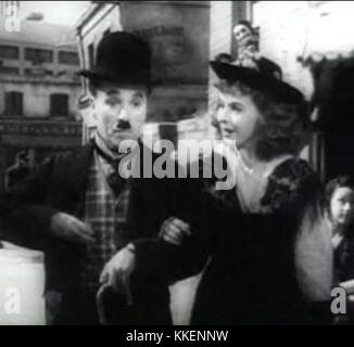 Charlie Chaplin et Paulette Goddard dans la remorque du Grand dictateur Banque D'Images