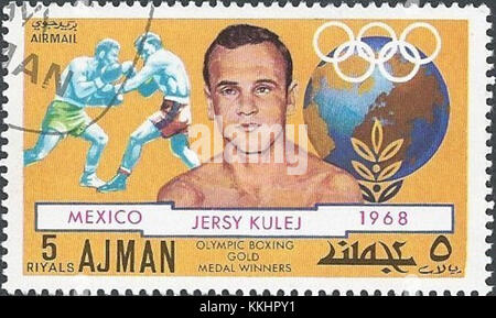 Jerzy Kulej, double médaillé d'or olympique et champion du monde de boxe polonais, est représenté sur un timbre de 1971 émis à Ajman, reconnaissant ses réalisations dans ce sport. Banque D'Images