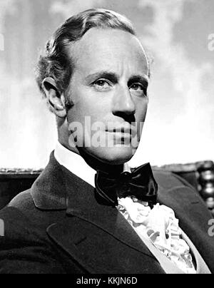 Leslie Howard, un acteur britannique, est surtout connu pour son rôle dans le film classique de 1939 *autant en emporte le vent*. Son interprétation d'Ashley Wilkes est devenue l'une de ses performances les plus emblématiques de l'histoire d'Hollywood. Banque D'Images