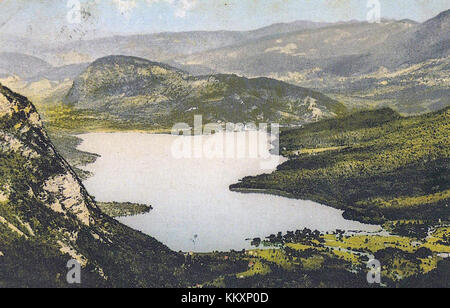 Une carte postale de 1910 montrant la beauté pittoresque du lac Bohinj en Slovénie, connu pour ses eaux cristallines et le paysage alpin environnant. Banque D'Images