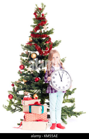 Girl near Christmas Tree Banque D'Images