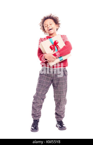 Boy posing with gift box Banque D'Images