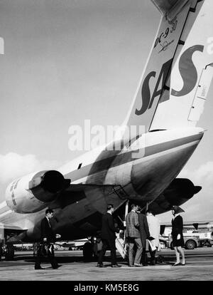 SAS DC 9 30, Kettil Viking se DBZ, loué à Swissair, au sol, à l'aéroport. Passagers à bord de l'appareil Banque D'Images