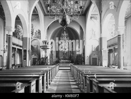 Nora Kyrka, située en Suède, est une église historique importante qui présente l'architecture classique suédoise et sert de repère religieux et culturel important. Banque D'Images