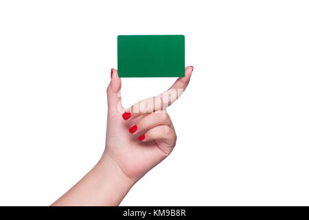 Woman's hand holding blank carte verte isolé sur blanc. Banque D'Images