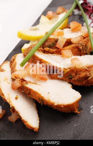 Tranches de poulet tikka platter Banque D'Images