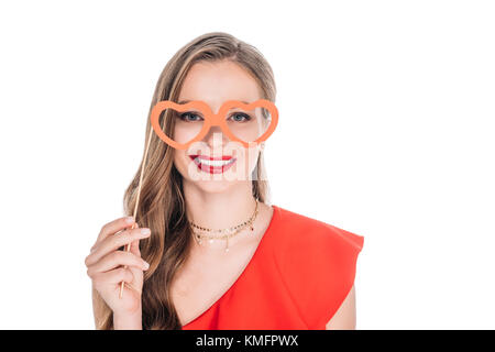 Fille avec des lunettes en forme de coeur sur stick Banque D'Images