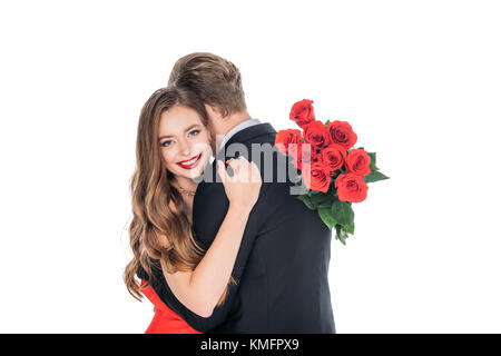 Jeune couple avec des roses Banque D'Images