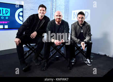 Construire avec le script d'annuaire local, Danny O'Donoghue, Mark Sheehan et Glen Puissance à Shropshire House, Londres. Banque D'Images