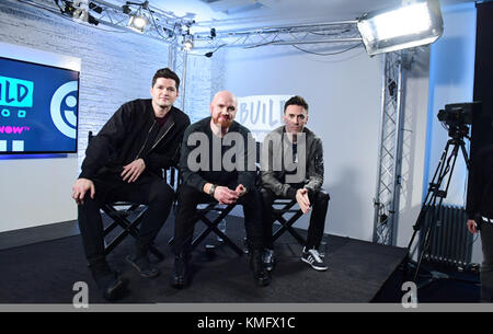 Construire avec le script d'annuaire local, Danny O'Donoghue, Mark Sheehan et Glen Puissance à Shropshire House, Londres. Banque D'Images