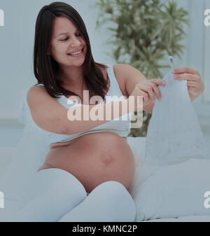 Pregnant woman smiling Banque D'Images