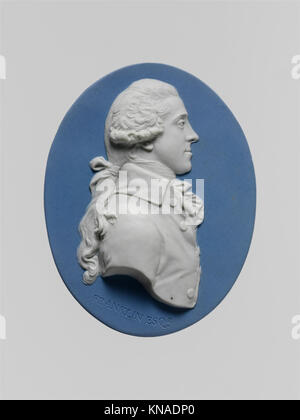 Ce médaillon de camée en faïence britannique, réalisé entre 1760 et 1800, présente un travail en relief complexe, reflétant le savoir-faire artisanal de l'époque et l'utilisation des camées dans les portraits. Banque D'Images