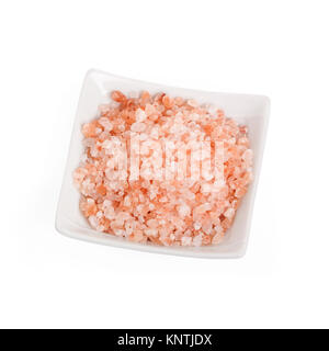 Fine sel rose de l'Himalaya dans un bol en céramique. Banque D'Images