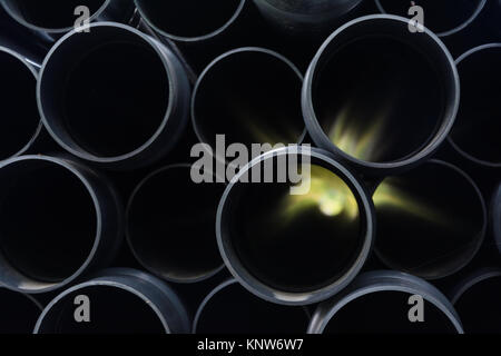 Glow Black Perspective Construction Tubes empilés Texture Background Banque D'Images