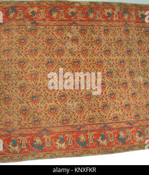 Un tapis de laine de la collection MET, identifié comme wb-1976.153e, représentant l'artisanat textile historique. Banque D'Images