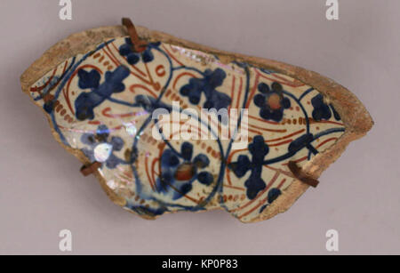 Un fragment de manuscrit ancien montrant la peinture miniature persane et la calligraphie décorative, illustrant des motifs historiques et culturels. Banque D'Images