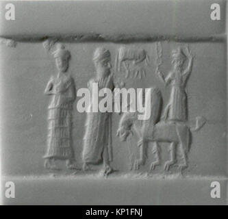 Ce vieux sceau cylindrique babylonien, datant du XVIIIe au XVIIe siècle av. J.-C., est fait d'hématite et provient de la Mésopotamie. Il mesure 1,1 pouces (2,79 cm) de longueur. Banque D'Images