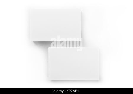 Une maquette de deux piles de cartes blanches, tourné à partir de ci-dessus, sur un fond blanc, avec une place pour le texte Banque D'Images