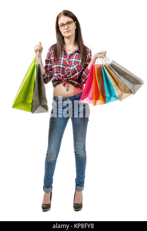 Jolie jeune femme a shopping sur fond blanc Banque D'Images