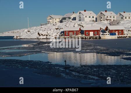 Village de pêche dans la neige Banque D'Images