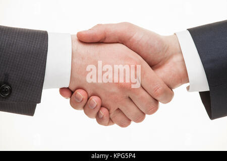 Businessmen shaking hands Banque D'Images