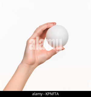 La femelle part holding white blank styrofoam ball Banque D'Images