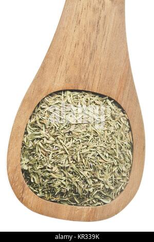 Les feuilles de thé sur une cuillère en bois Banque D'Images