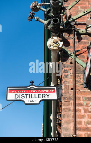 Inscrivez-vous sur le côté d'un immeuble à l'intersection de la Distillerie lane et Trinité dans la distillerie historique quartier touristique en Toronto Canada Banque D'Images