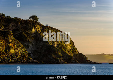 Port de Charlestown, St Austell, Cornwall, UK. Pendant et peu après le lever du soleil sur cool journée calme dans la région de la baie de St Austell South Cornwall, UK. Banque D'Images