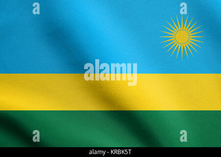 Brandissant le drapeau du Rwanda avec la texture de tissu Banque D'Images