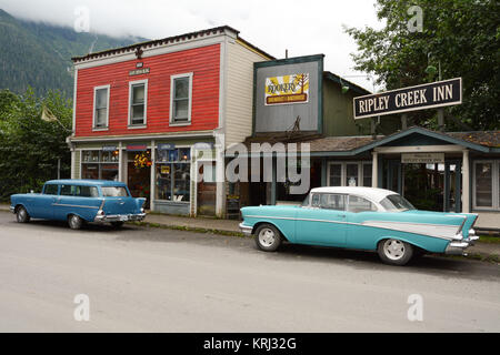 Restauré, tournant du siècle de magasins sur la rue principale de la vieille ville minière de Stewart, en Colombie-Britannique, Canada. Banque D'Images