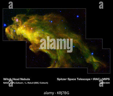 Huit cent années-lumière dans la constellation d'Orion, un gigantesque nuage sombre appelé "tête de sorcière' nébuleuse est brewing baby stars. Les nourrissons stellaires se révèlent comme pink dots dans cette image du télescope spatial Spitzer de la NASA. Brins de vert dans le nuage sont des molécules riches en carbone appelés hydrocarbures aromatiques polycycliques, qui sont trouvés sur des barbecues et dans les gaz d'échappement des véhicules sur terre. Cette image a été obtenue dans le cadre du Programme de recherche du télescope spatial Spitzer pour les enseignants et les élèves, impliquant les enseignants du secondaire et de leurs élèves de partout aux États-Unis. L'infrar Banque D'Images