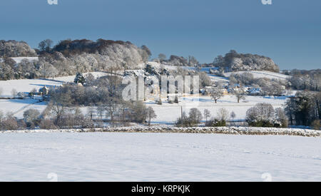 Netherswell Manor dans la campagne autour de Stow on the Wold dans la neige de décembre. Stow on the Wold, Cotswolds, Gloucestershire, Angleterre. Vue panoramique Banque D'Images