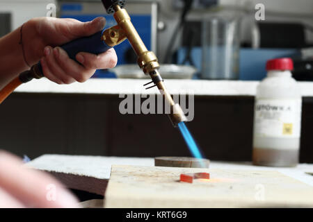 L'atelier soleil,artisan graveur d'or Banque D'Images