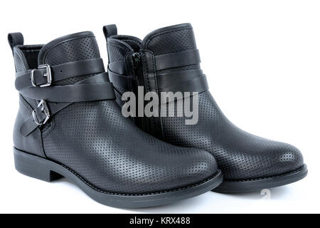 Boot chaussures mode femme en cuir noir, photographiés sur fond blanc Banque D'Images