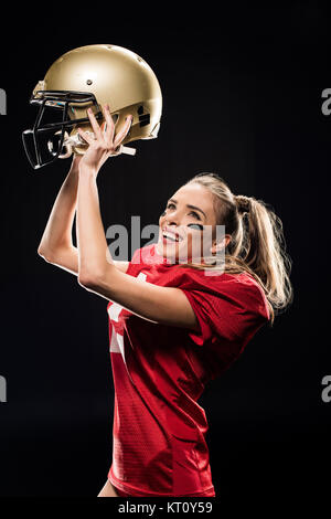 Football player cheering with helmet Banque D'Images